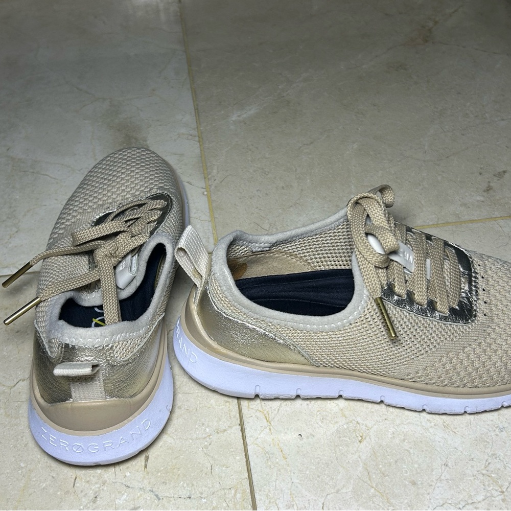 gold and tan shoes